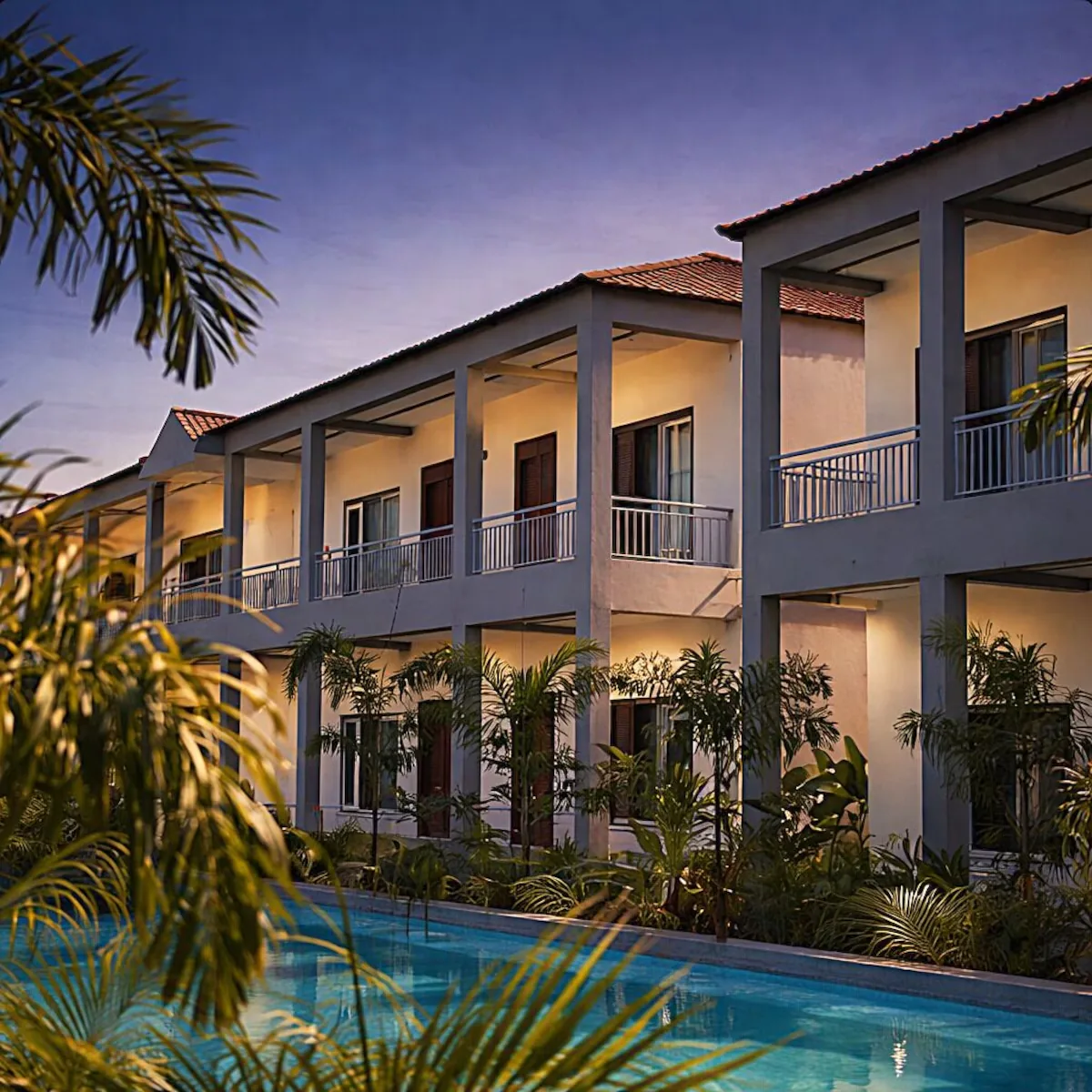 Lavender Hotel exterior and pool at dusk