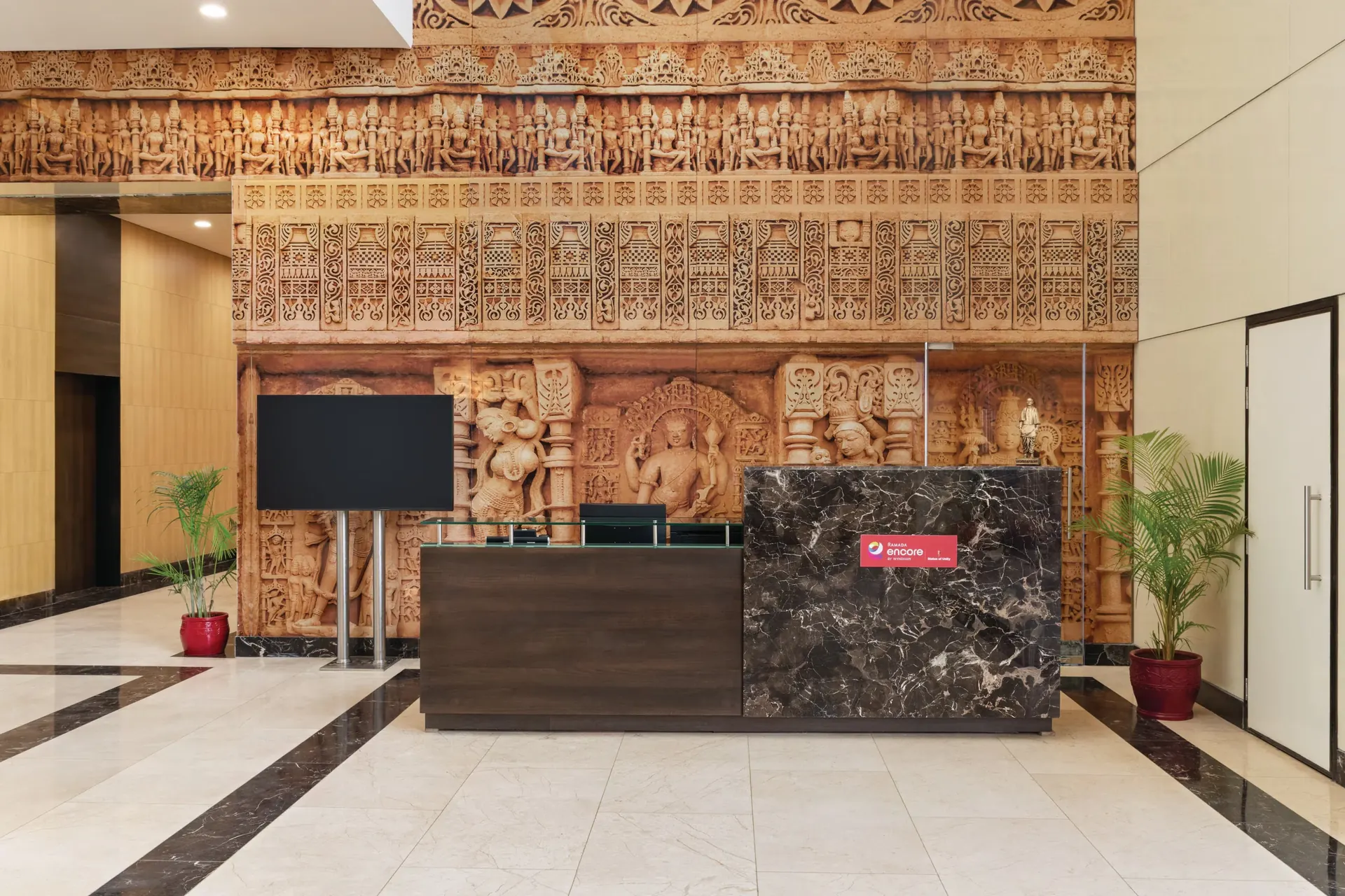 Sculpted stone reception lobby at Ramada Encore by Wyndham, Kevadia
