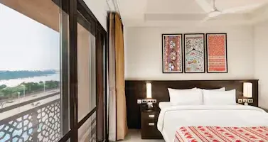 River-Facing Balcony at Ramada Encore by Wyndham
