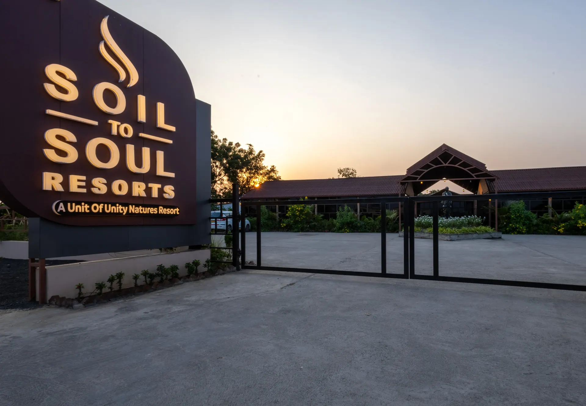 Entrance signage at Soil To Soul Resort, Kevadia